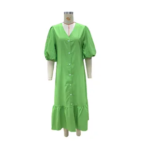 Elegant lime green button-up maxi dress featuring stylish puff sleeves and ruffled hem.