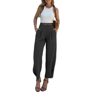 Full-length view of women's dark high-waisted loose trousers with tapered button hem detail