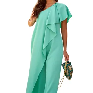 Detailed view of elegant mint green one-shoulder ruffled wide-leg jumpsuit for summer