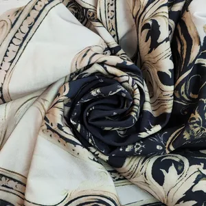 Close-up view of vintage Baroque print fabric with elegant swirls and textures