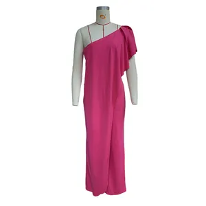 Detailed view of pink one-shoulder jumpsuit with ruffled sleeve on white mannequin