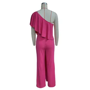 Back view of pink one-shoulder jumpsuit with ruffle details and wide-leg design