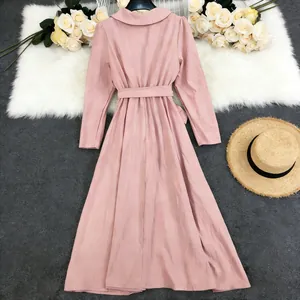 Elegant pink solid color long sleeve cotton linen maxi dress with waist belt for spring.