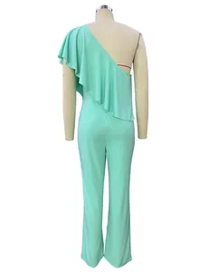 Back view of a chic mint green one-shoulder jumpsuit with an elegant ruffle detail.