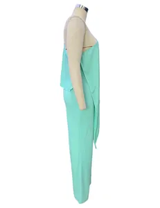 Detailed side view of a stylish mint green one-shoulder wide-leg jumpsuit for women