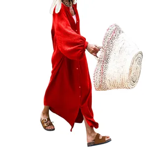 Loose red long sleeve button-down maxi dress featuring textured fabric for resort wear
