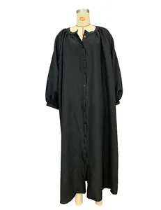 Detailed front view of a loose black vacation style maxi dress displayed on a mannequin