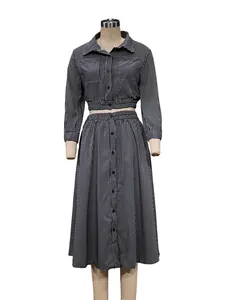 Detailed view of the striped long-sleeve shirt and matching button-down midi skirt set.
