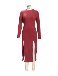 Detail view of burgundy mock neck long sleeve ribbed dress with double front slits.