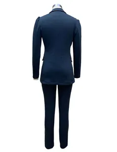 Professional navy blue long sleeve blazer and trousers suit set shown from the back