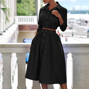 Elegant black pinstripe two-piece set with cropped long-sleeve shirt and midi skirt