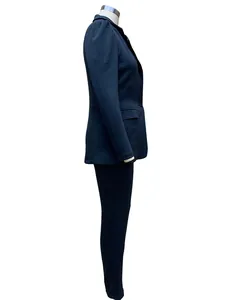 Side view of elegant navy long sleeve blazer and matching slim fit trousers on mannequin