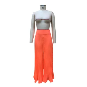 Elegante orangefarbene plissierte weite Hose für Damen mit hoher Taille und langer Silhouette