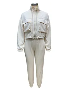 Front view of women's off-white 2-piece leisure tracksuit with cargo jacket and joggers