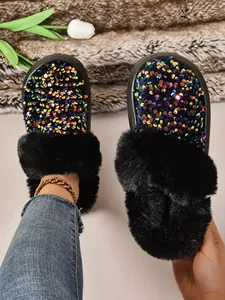 Primer plano de zapatillas con plataforma para mujer con lentejuelas y pelo negro