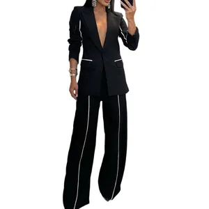 Elegant black two-piece blazer suit set with white piping for women's chic style