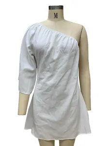 Detail view of white one-shoulder cotton linen dress with a loose and fashion fit