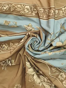 Detailed macro view of retro floral print fabric texture for elegant summer maxi dress