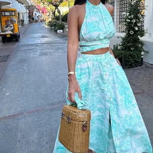 Detailed view of women's two-piece resort set with mint green animal toile print