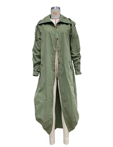 Close-up view of olive green long trench coat with large lapel and buckled sleeve cuffs
