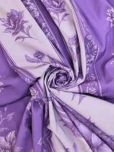 High-quality close-up of vintage purple floral print pattern on summer maxi dress fabric
