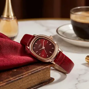 Montre à quartz vintage ovale pour femme avec bracelet en cuir rouge et boîtier en or rose