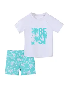 Two-piece swimwear set for boys featuring a white short-sleeve top and teal palm shorts