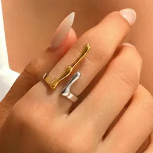 Adjustable stainless steel antler open ring with gold and silver organic design