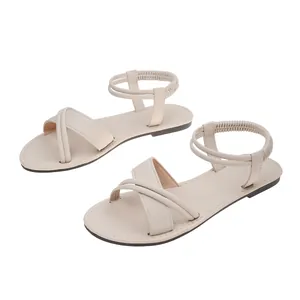 Beige women's Roman flat sandals with soft leather straps and elastic heel band
