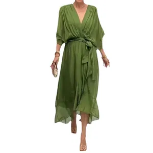 Elegant green V-neck maxi dress with batwing sleeves and an adjustable waist tie.