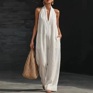 Elegant white sleeveless linen-blend halter neck wide-leg jumpsuit for summer resort wear
