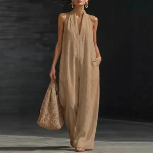 Elegant khaki halter neck sleeveless jumpsuit with deep V-neck and wide leg silhouette