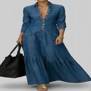 Detailed look at a vintage-style denim maxi dress featuring long sleeves and button front.