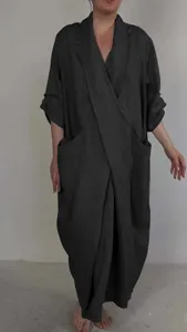 Loose fit linen robe dress in charcoal grey featuring deep V-neck and oversized pockets