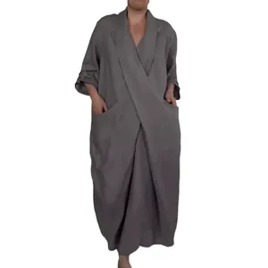 Minimalist grey linen maxi robe dress featuring a deep V-neck and functional large pockets