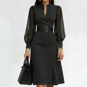 Elegant black denim dress with sheer mesh puff sleeves and waist-cinching belt