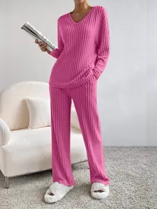 Elegant pink ribbed knit 2-piece lounge set with V-neck top and straight-leg pants