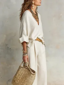 Bohemian chic natural linen loose holiday set featuring a V-neck top and wide-leg pants