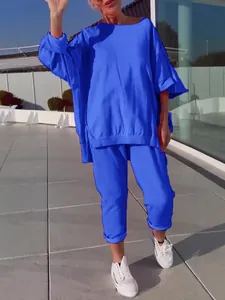Casual σετ δύο τεμαχίων σε έντονο μπλε με μακρυμάνικο τοπ και ασορτί παντελόνι για γυναίκες.