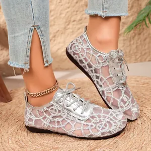 Silver lace mesh flats for women with sparkling rhinestone details and tie-up design