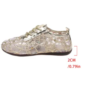 Gold lace mesh flats for women detail view highlighting the comfortable 2cm heel height.