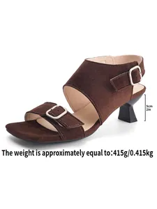 Detail of brown suede mule sandal showing 5cm sculptural heel and weight info