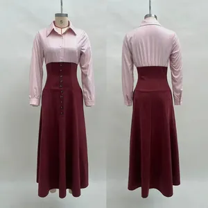 Dettaglio fronte e retro di un abito bordeaux a trapezio con top a righe e vita alta
