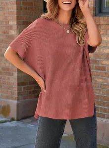 Women's rose pink knit t-shirt with loose drop shoulder design and round neck line.
