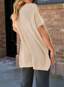 Back view of a beige knitted short-sleeve top with relaxed drop shoulders for women