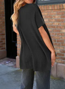 Back view of a stylish black oversized ribbed knit short sleeve pullover T-shirt