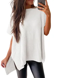 Detailed view of women's white ribbed knit short-sleeve top with loose drop shoulder fit