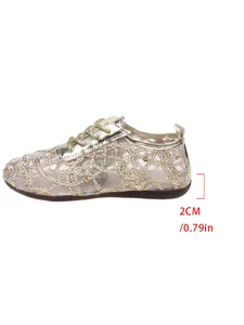 Detail view of women's mesh flats showing 2cm heel height and lace-up design