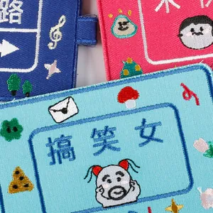 Funny double-sided embroidered luggage tags with cute cartoon characters and Chinese text