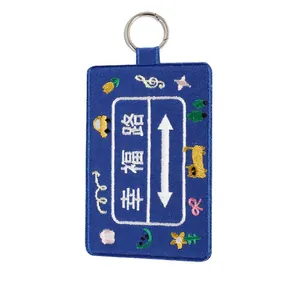 Durable blue embroidered luggage tag featuring double-sided happiness road design